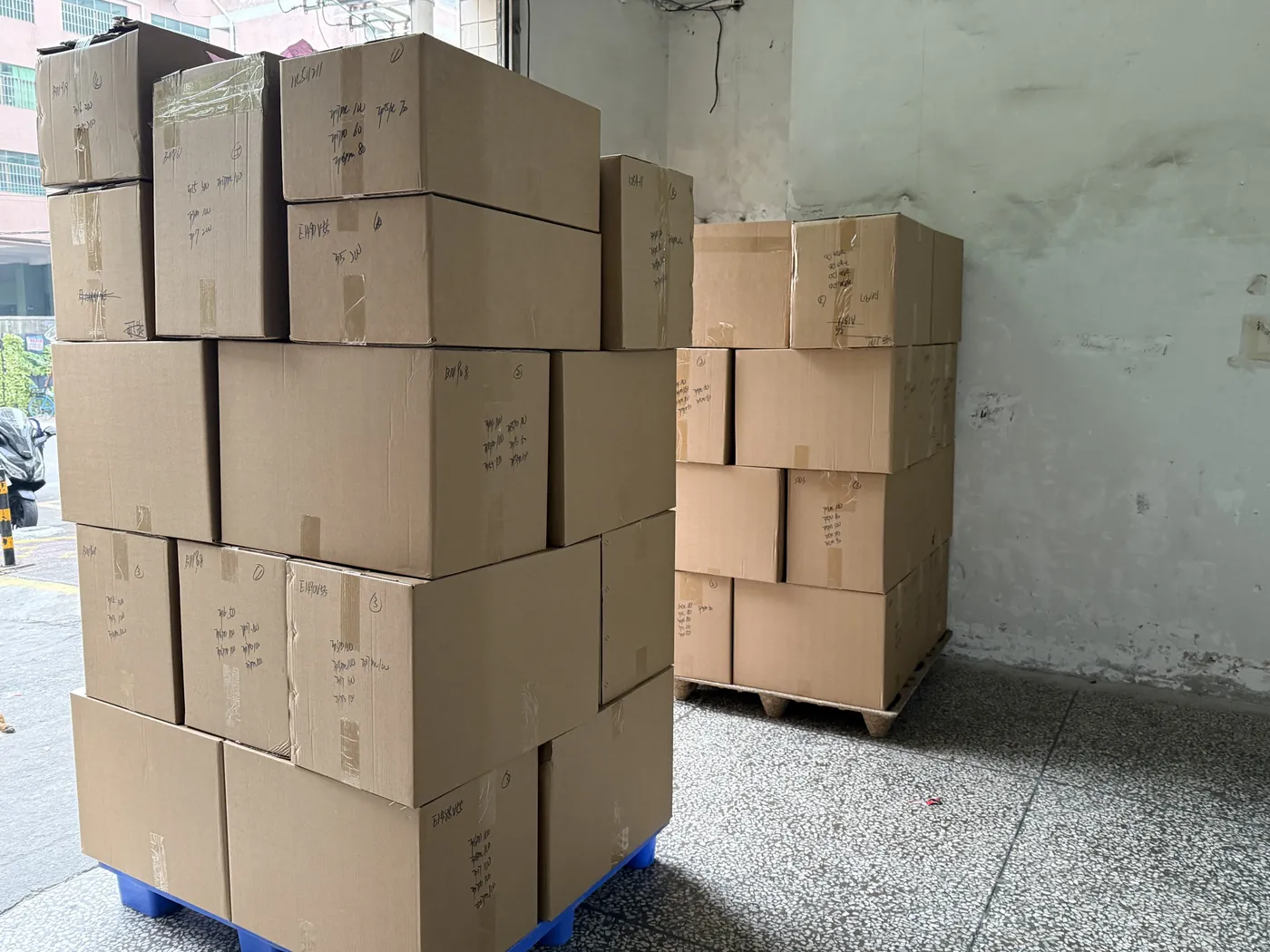 Neutral cartons grouped in a warehouse packing area
